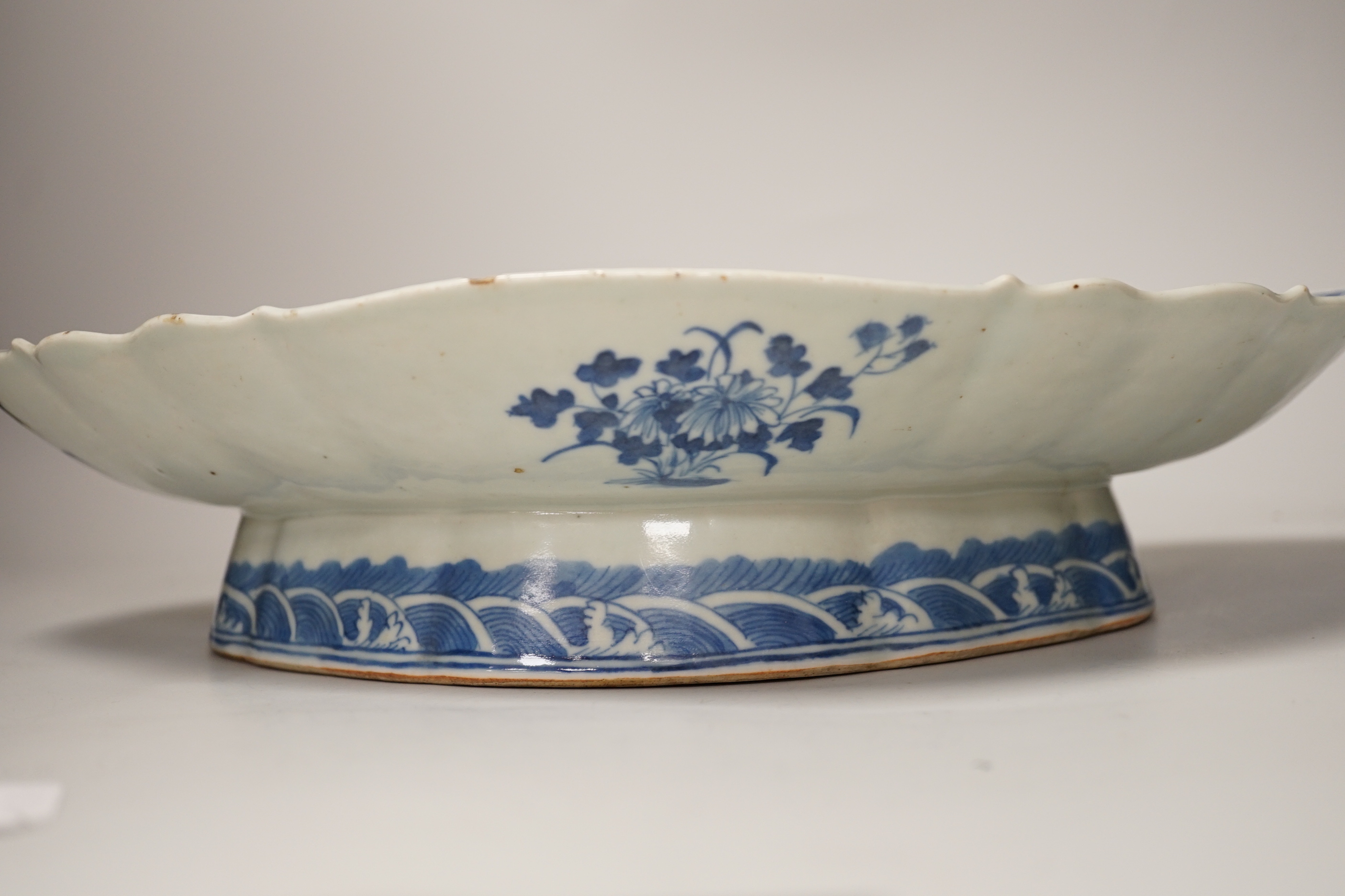 A 19th century Chinese blue and white ‘dragon’ lozenge shaped dish, 39cm